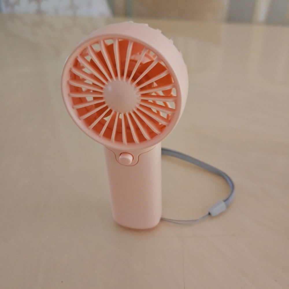 Mini handheld fan - new in box